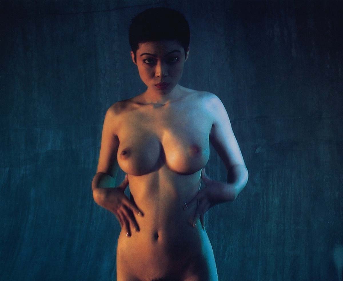 Arakitronics by Nobuyoshi Araki, first published 1994. A nude Japanese girl in a variety of BDSM and bondage scenarios.