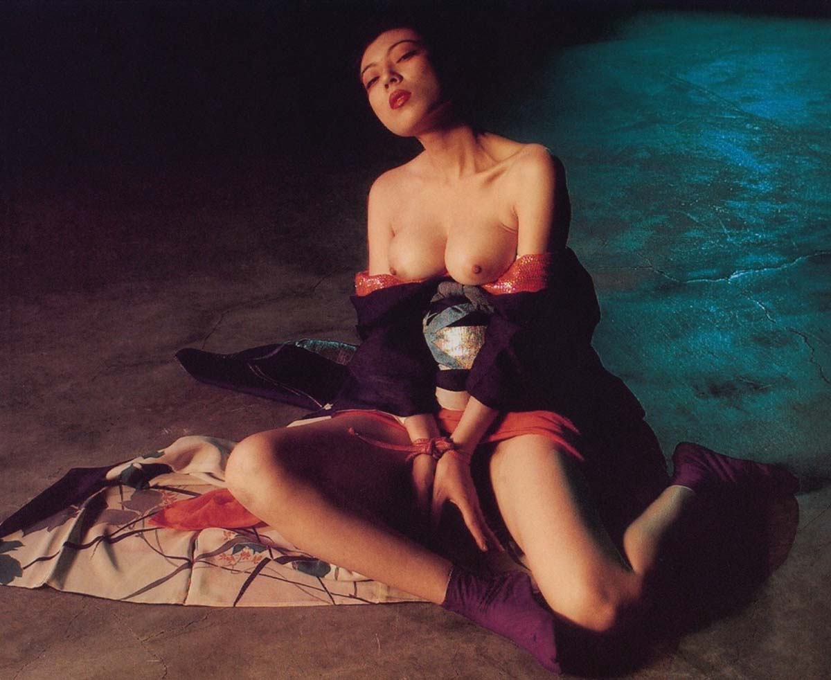 Arakitronics by Nobuyoshi Araki, first published 1994. A nude Japanese girl in a variety of BDSM and bondage scenarios.